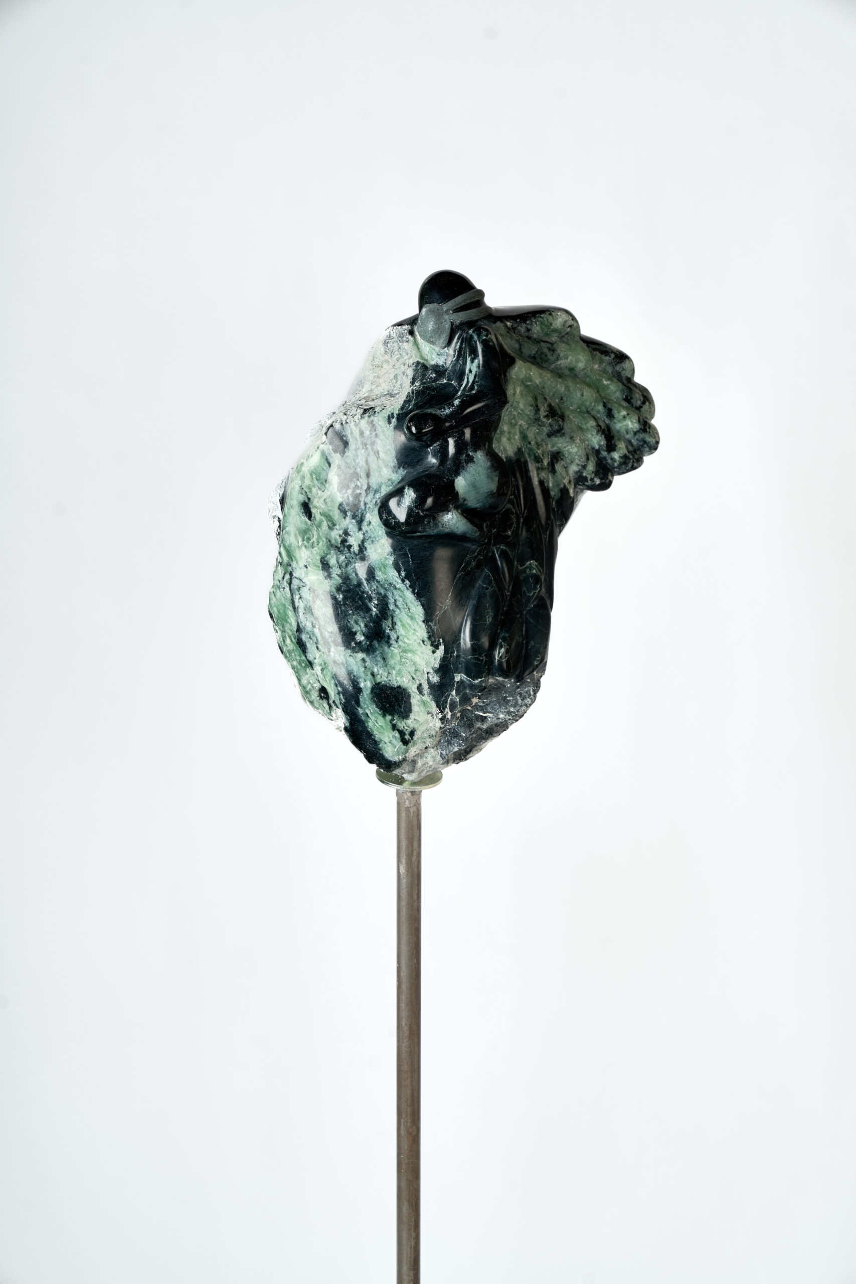 Covid Angel, a stone sculpture by Winnipeg artist Greg Fritz