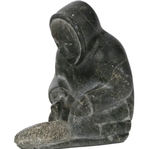 Man Carving a Qulliq (Kudlik) - sculpture by Inuit artist Kalingo - view 1