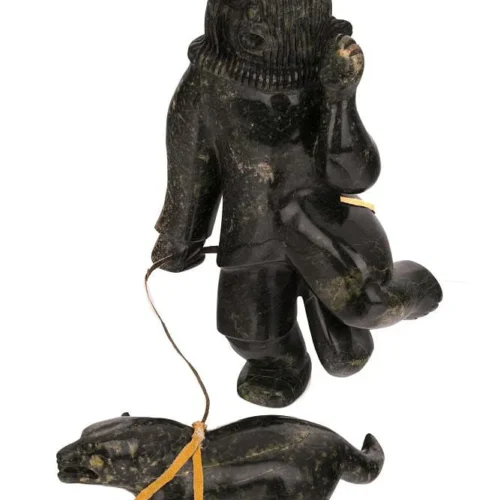 Shaman With Sled Dog sculpture by Inuit artist Palaya Qiatsuk