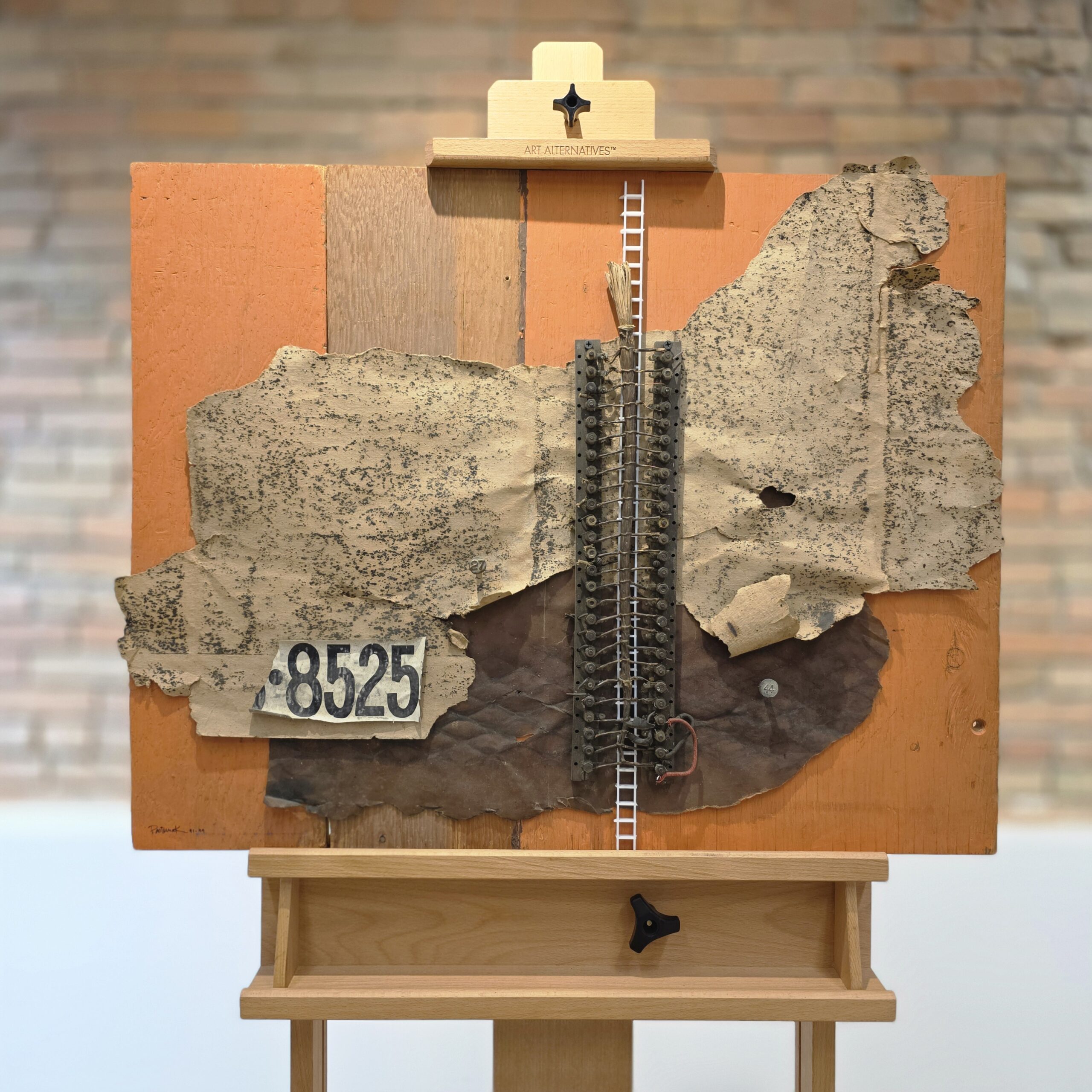 Tracks 825, assemblage by Winnipeg artist Robert Pasternak - on easel